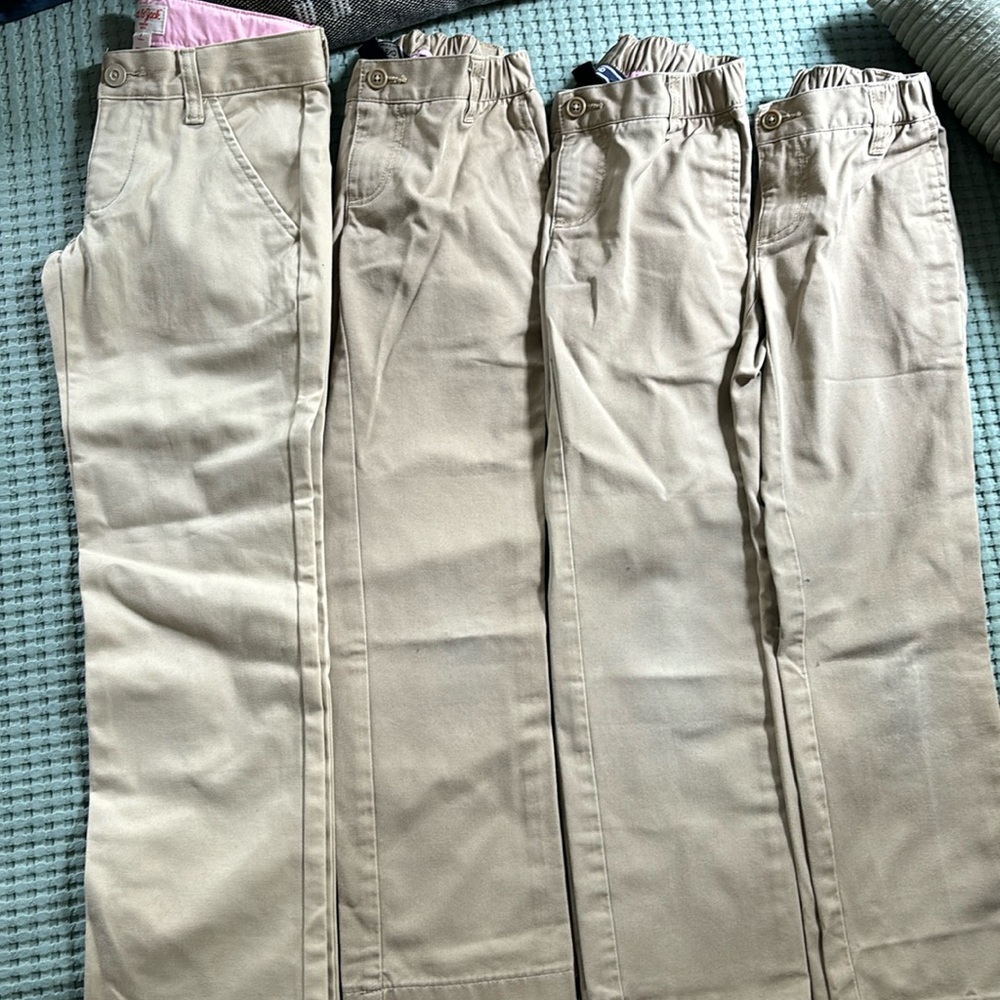 Lot of 4 khaki uniform pants. 3 Lands End and 1 Cat and Jack. Girls size 7.